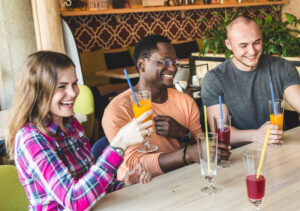 co-workers drinking Juices in meeting