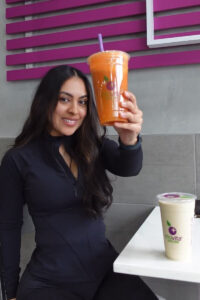 Social media influencer holding juice