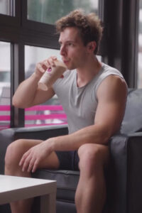 Social media influencer drinking smoothie